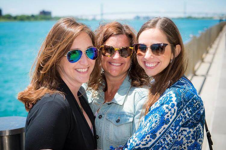 Becca, Shannon and Danielle enjoying the sunshine at Cobo Hall. Photo by Paul Stoloff.